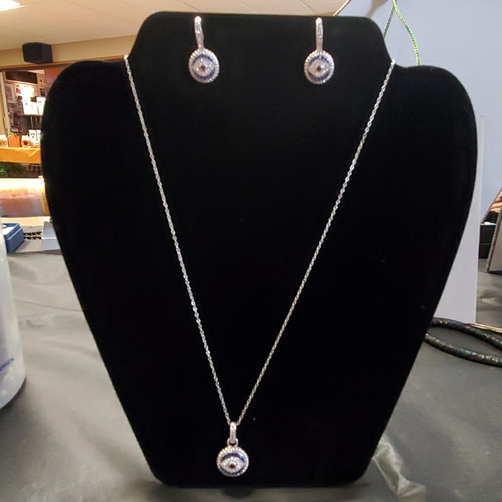 Necklace and earring set in sterling silver.